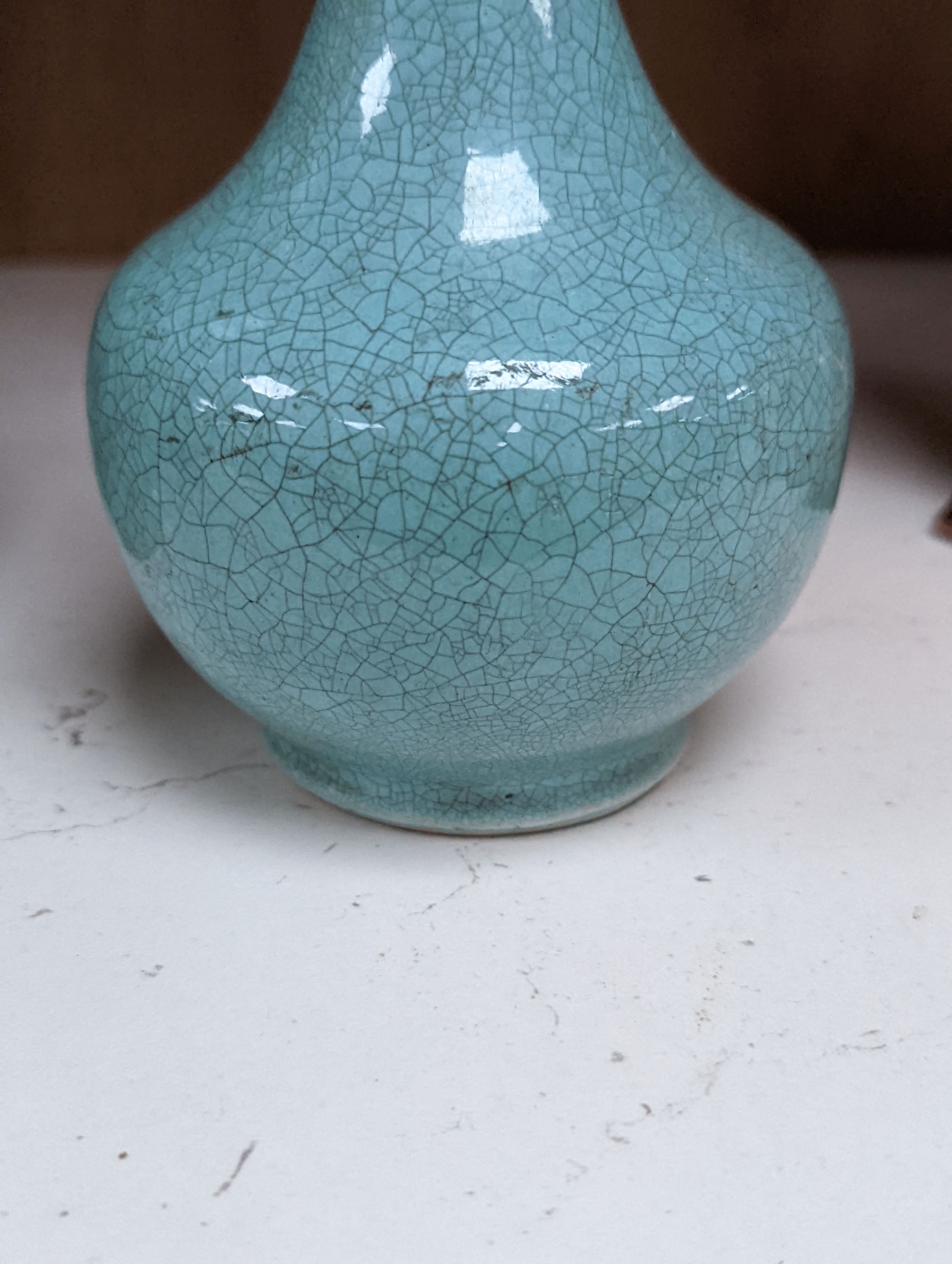 Three 19th Chinese monochrome glazed vases, with sang de boeuf, celadon and turquoise crackle glaze, tallest 21 cm